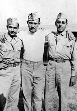 Ian Williams with two of his many friends at Camp Howze, Texas in 1943.