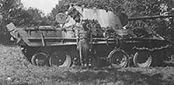 John in front of broken down German Panther Tank.