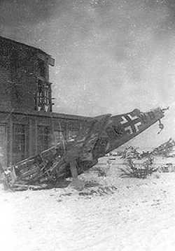 These are photos of a downed German aircraft at our base at Rheims-Courcy in northeastern France in 1944