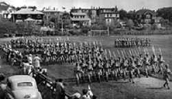 "D" Company, RR of C march past having taken the "stick" that day