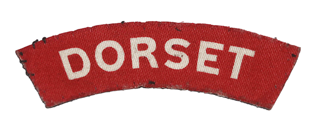 A genuine printed WW2 Dorset Regiment Shoulder title
