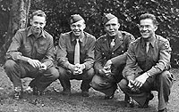 This picture was taken August 20, 1944 in Tilehurst-Reading, England, just a few weeks before the 101st participated in the Holland campaign in mid-September. I well recall the day this was taken for just seconds before, a German buzz bomb could be heard exploding over England not too far from where we had gathered. All four of the young men, then in our early twenties, were lucky to survive the war without major physical damage and were able to return to America in late 1945